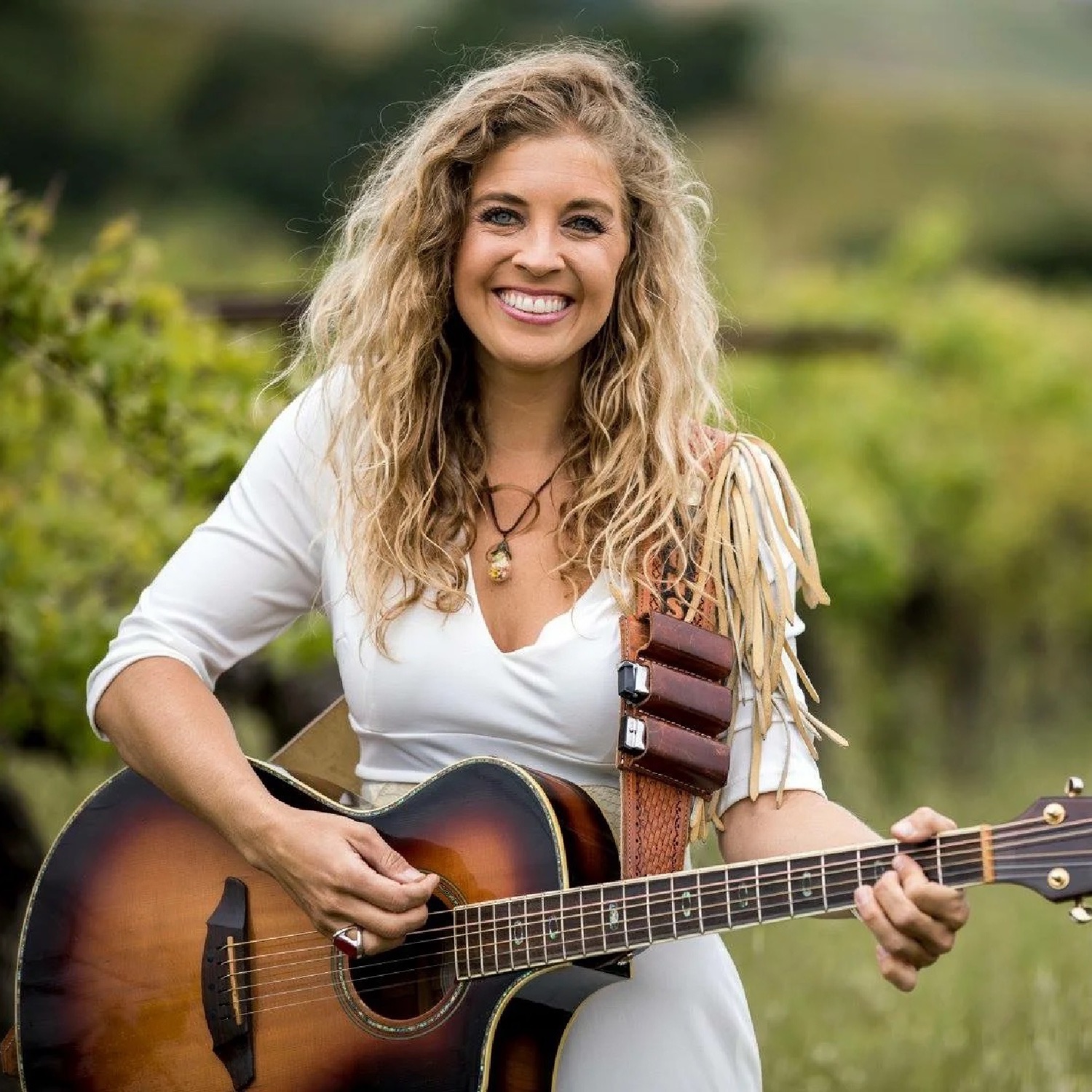 Erica Sunshine Lee - Trop Rock award winning artist with an unstoppable smile
